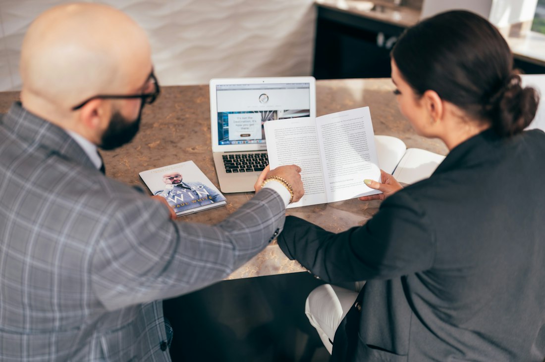 Financial report being discussed at a table