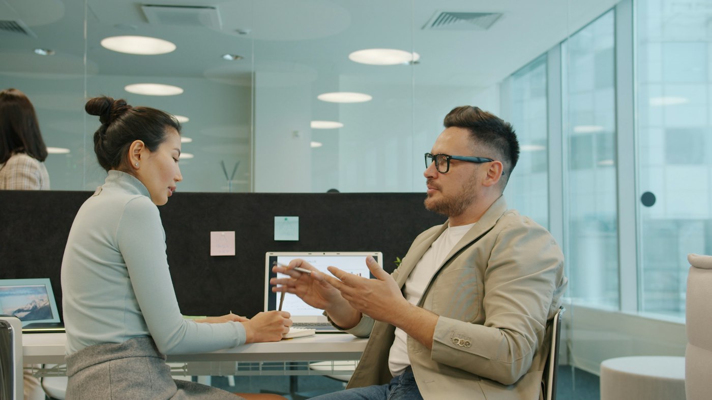 Colleagues working together in an office